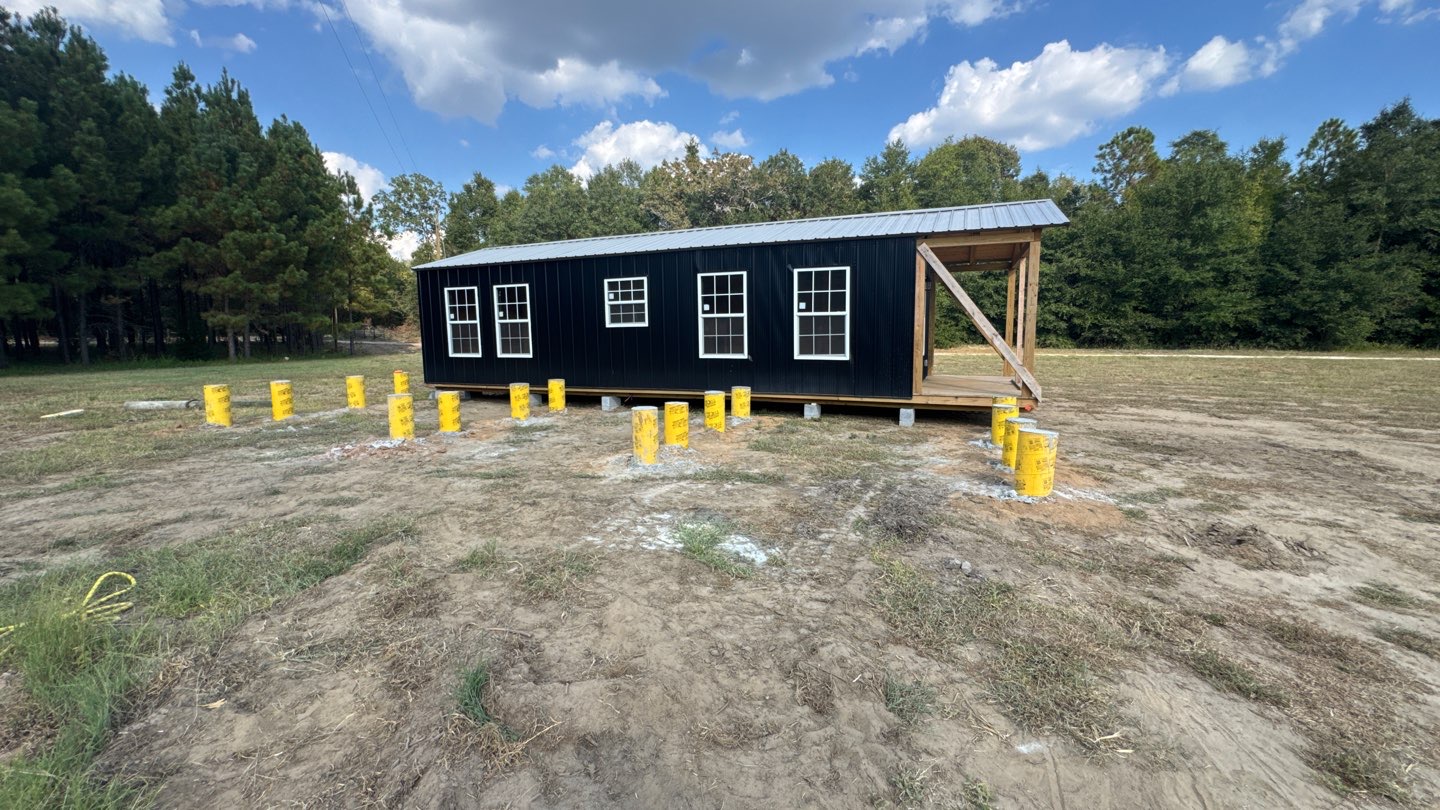 Custom barndominium cabin exterior in Greenwood, FL