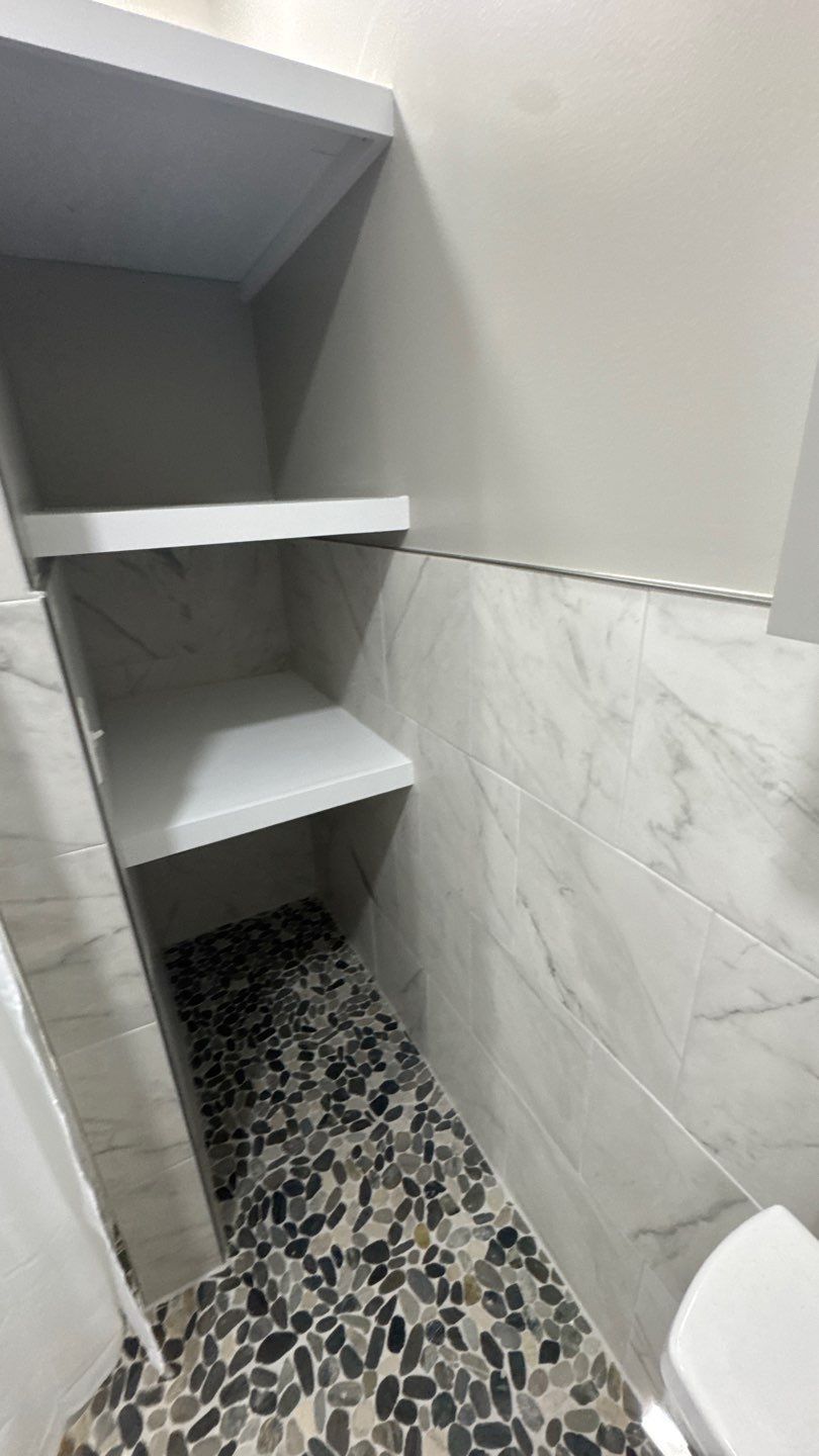 Built-in bathroom storage shelves