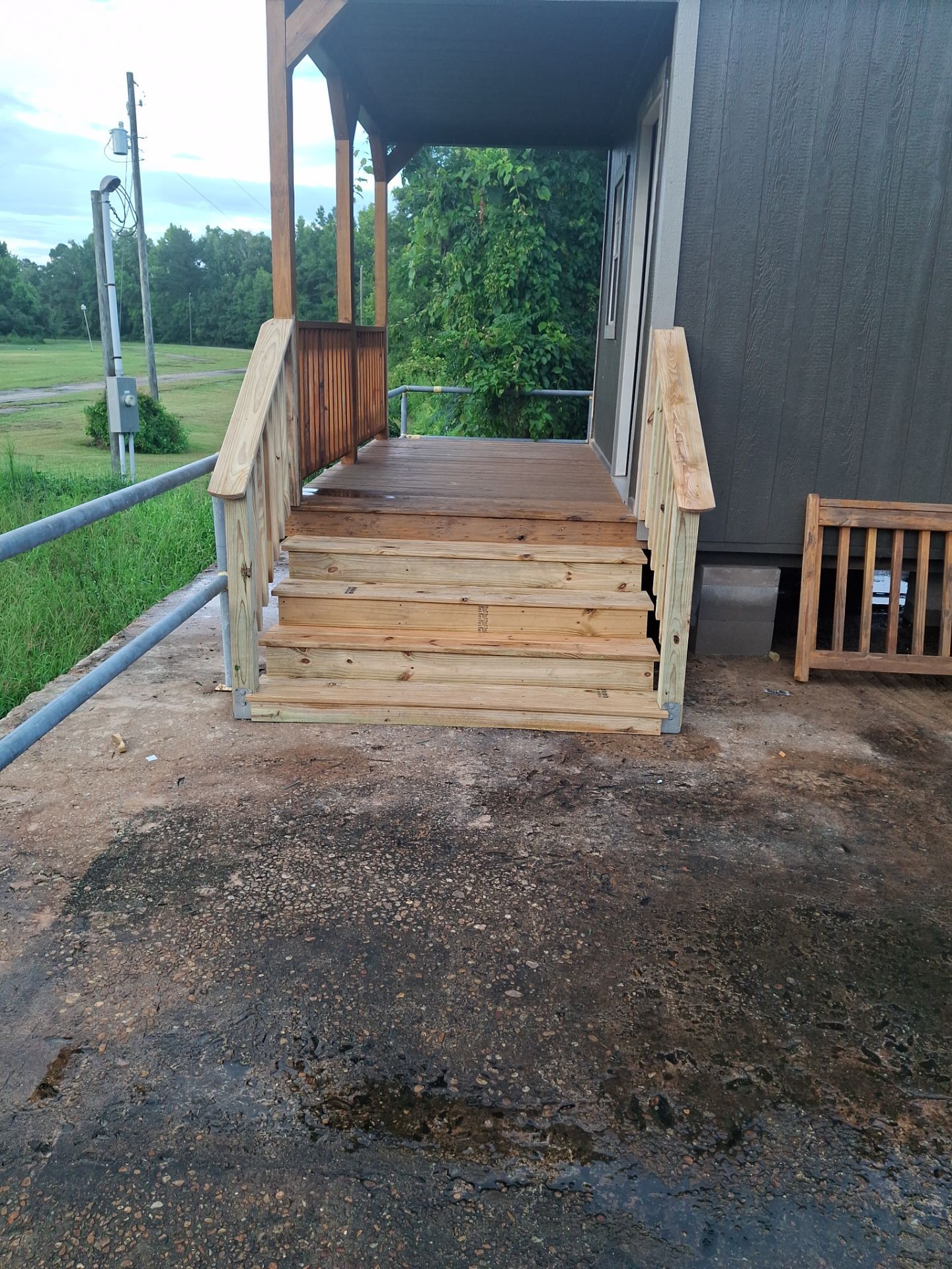 Steps beneath a covered entry