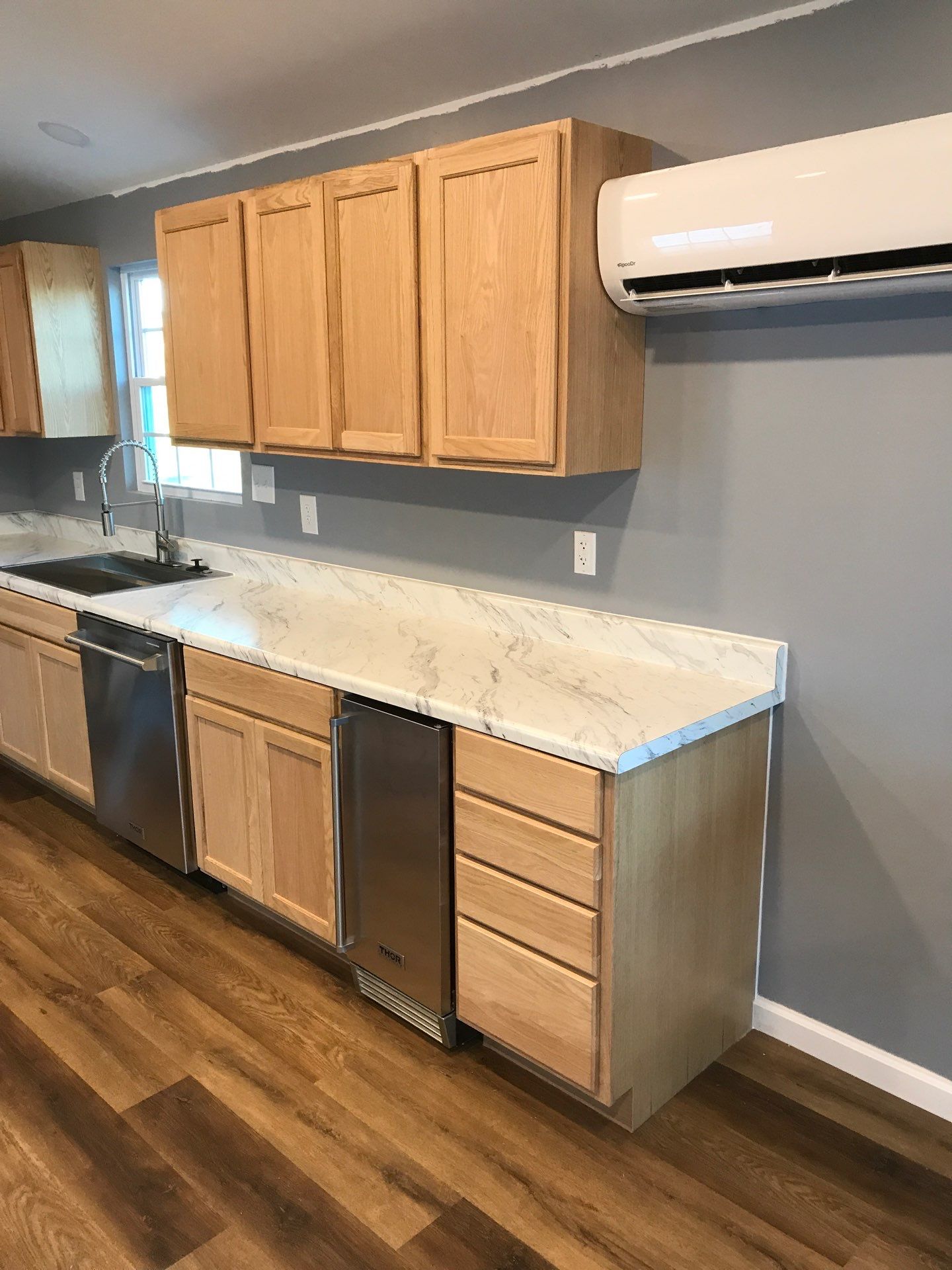 Cabinetry and interior details during a custom shed build-out