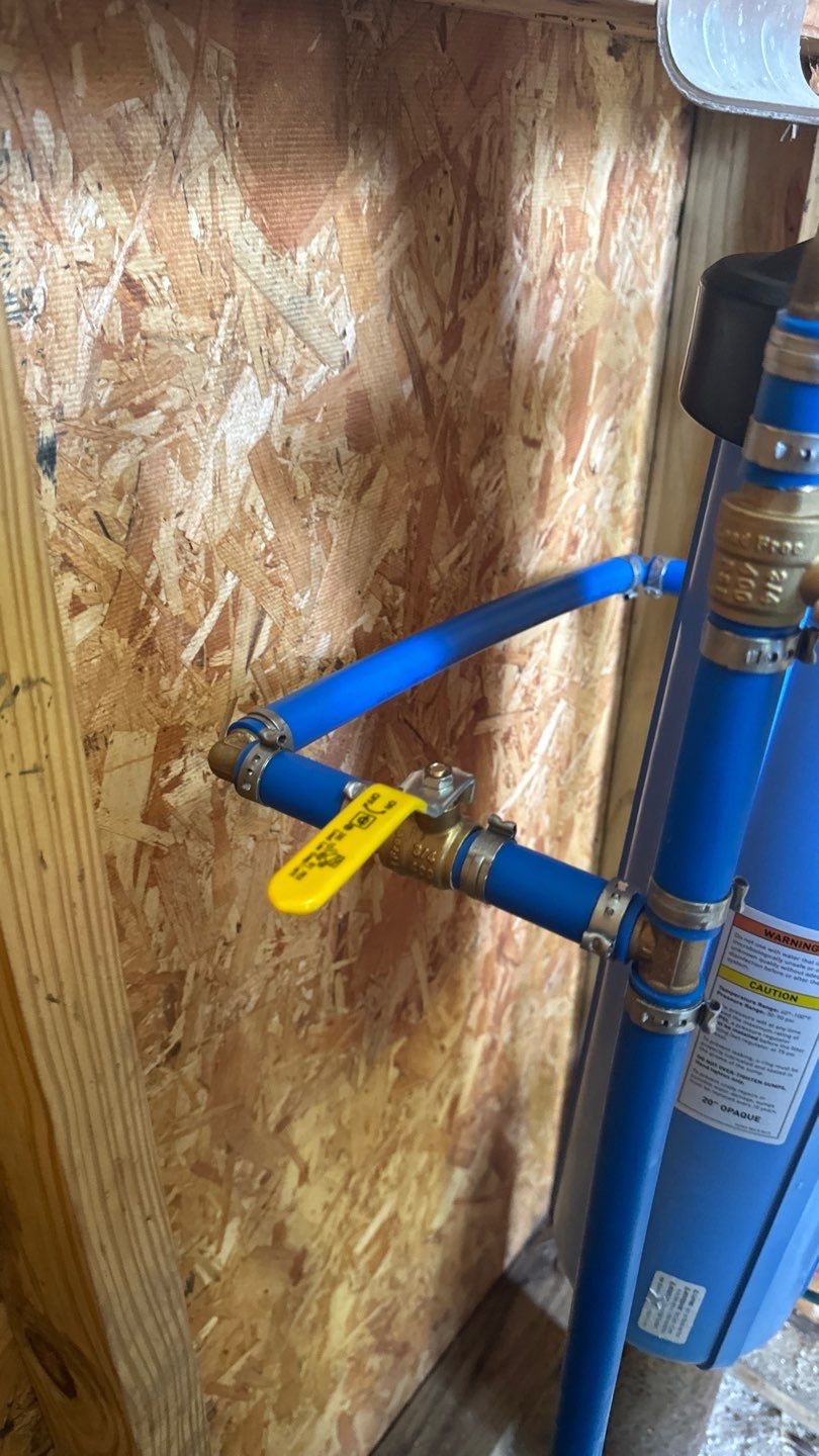 PEX piping and shutoff valve connected to a water filter