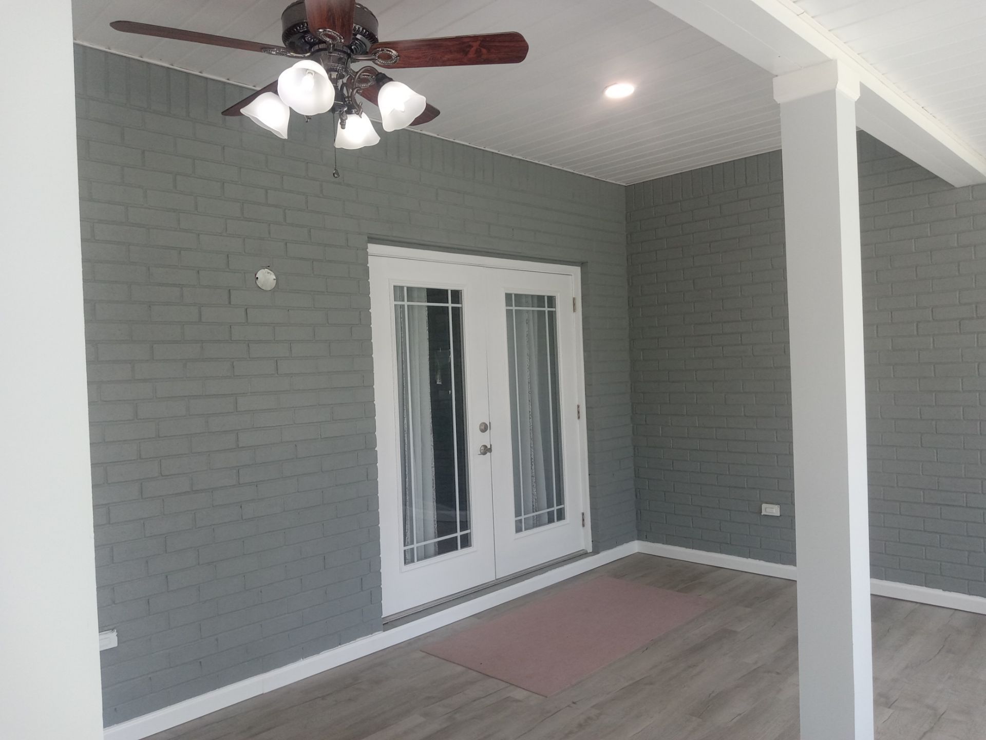 French doors with painted walls and white trim