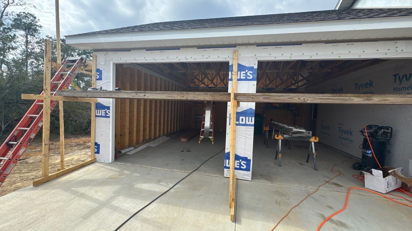 Garage openings and concrete slab during construction