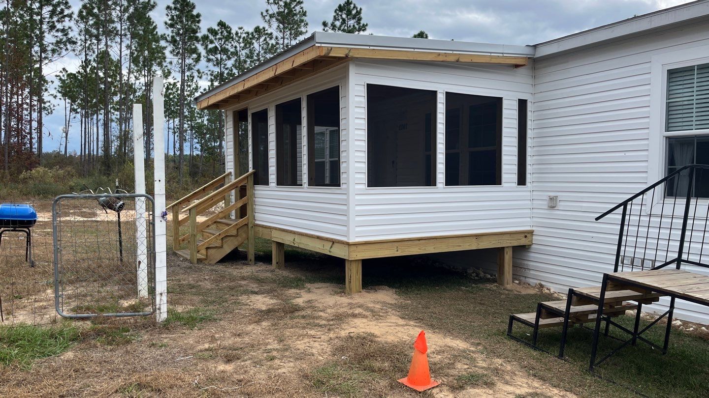 Screened porch with siding and entry steps
