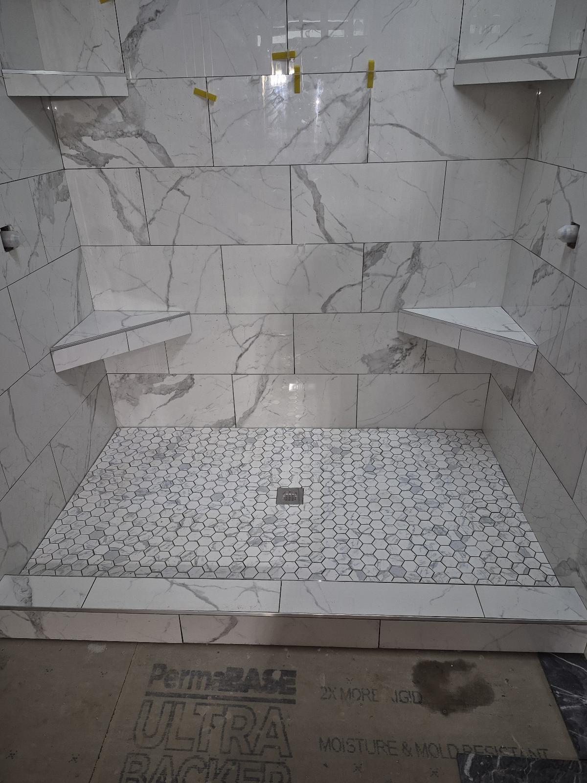 Shower tile installation in progress
