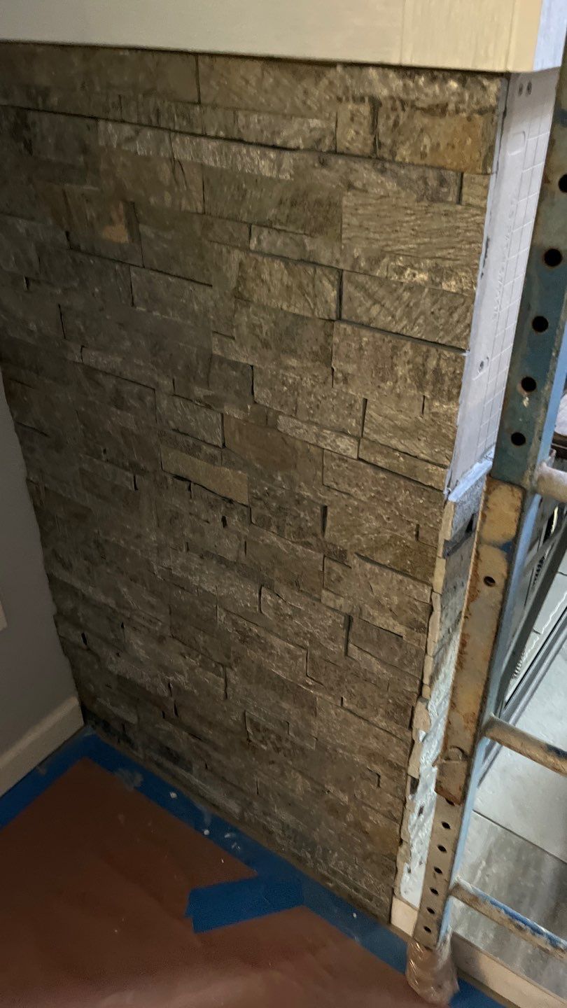 Stacked-stone facing during installation