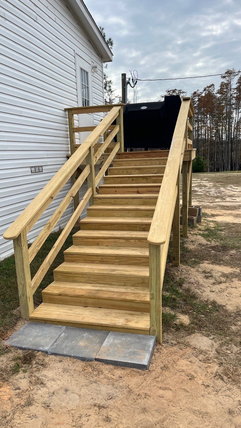 Wood entry stairs with handrails
